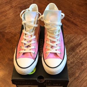 Converse pink and white hi top sneakers